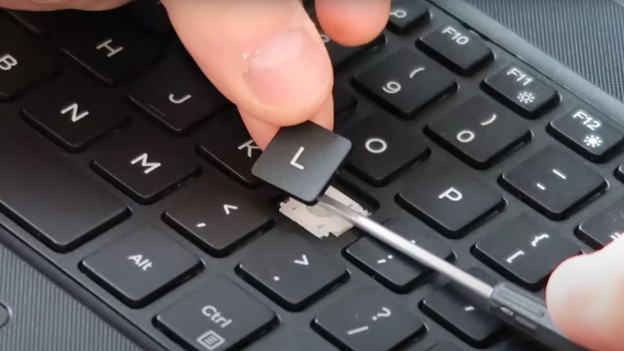 Cách tháo nút bàn phím laptop